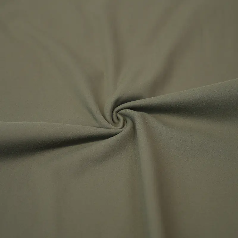Was ist Nylon Spandex -Interlock -Stoff und wie unterscheidet es sich von anderen Arten von Strickstoffen?
