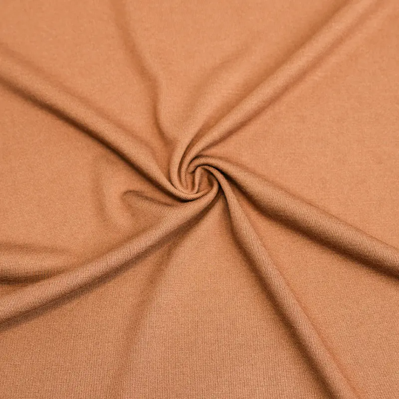 Wie verbessert Feuchtigkeit und Schnell trockener Stoff die sportliche Leistung bei Sportswear?